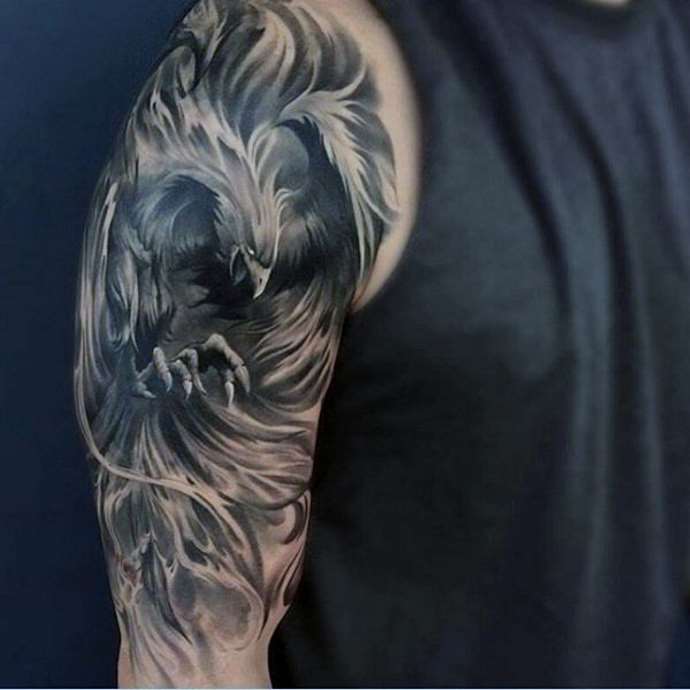 Татуировка феникса на руке
