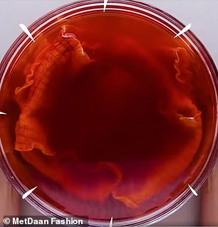 Adding the water creates a red watery liquid perfect for dying clothes
