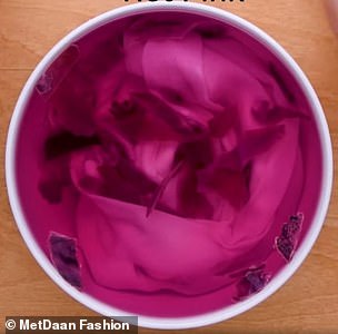 After creating the purple dye, adding some vinegar creates a hot pink colour