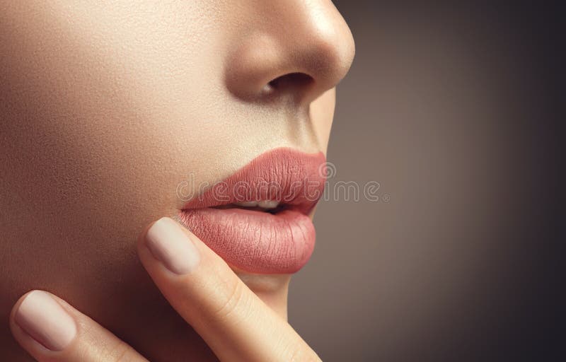 Beauty woman with natural makeup and beige nailpolish. Beauty woman with natural makeup and beige nail polish stock photography