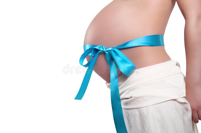 Belly with blue ribbon bow of pregnant. Woman, isolated over white background stock photo
