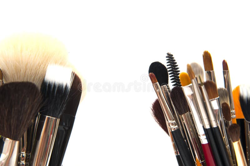 Makeup brushes. Colorful makeup brushes isolated on white stock photos