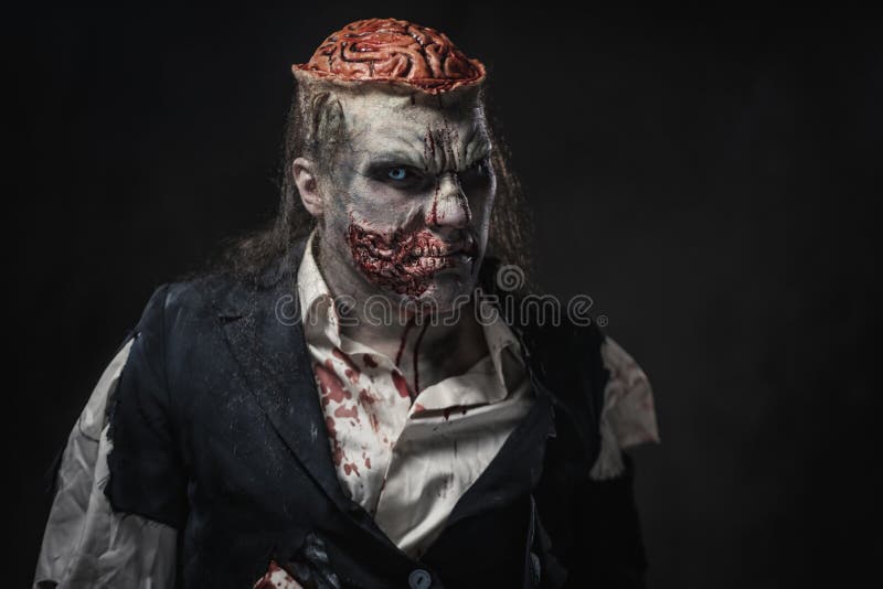 Scary zombie prostheric makeup on male model.  stock photos